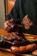 EMUNÁ Asador Argentino